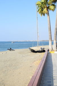 Scenic view of beach against clear sky