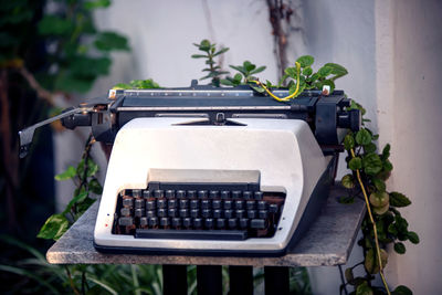 Close-up of vintage typewriter on table