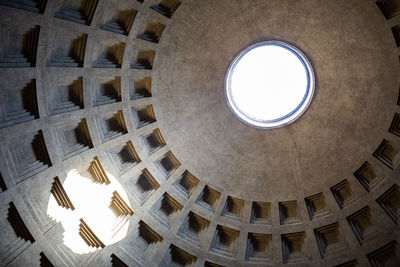 Low angle view of skylight in building