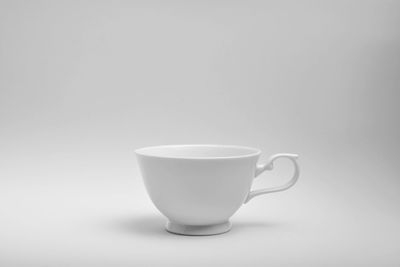 Close-up of coffee cup against white background