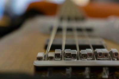 Close-up of guitar on table