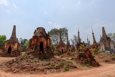 Old temple building against sky