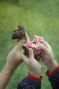 Midsection of woman holding ice cream