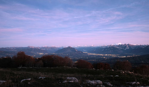 High anle view of mountainous town at sunset