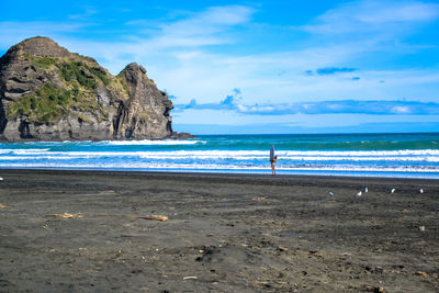 Scenic view of beach against sky