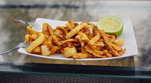 Close-up of food served on table