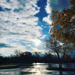 Scenic view of lake against sky at sunset
