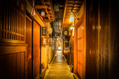 Illuminated corridor of building