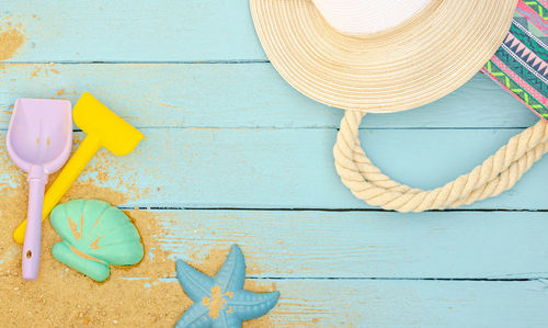 High angle view of candies on table against wall