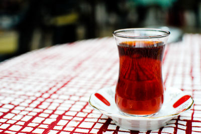 Close-up of tea in glass on table