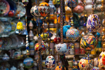 Close-up of lanterns hanging for sale in market