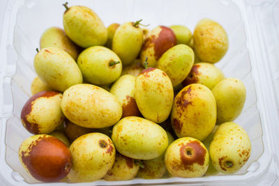 High angle view of fruits in container