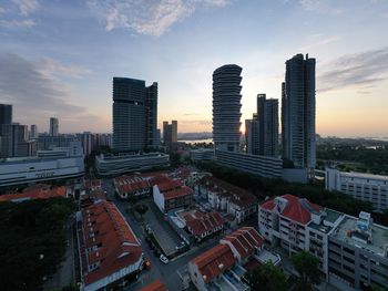 High angle view of buildings of bugis against sky during sunset