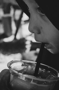 Close-up of girl drinking glass