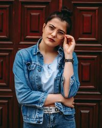 Happy woman standing at home