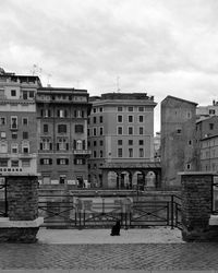 Residential buildings against sky in city