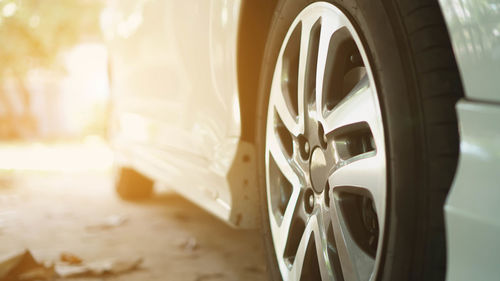 Close-up of tire on car