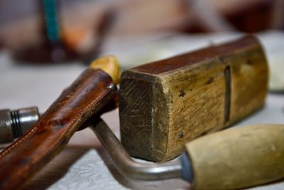 Close-up of rusty metal on table