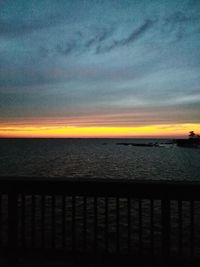 Scenic view of sea against sky at sunset