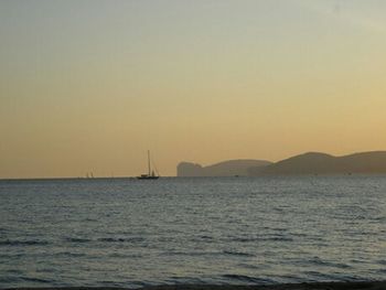 Scenic view of sea at sunset