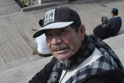 Portrait of man wearing hat