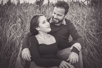 Young couple kissing in grass