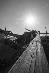 Close-up of wood against sky