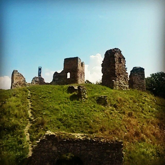 old ruin, built structure, architecture, history, ancient, the past, old, building exterior, grass, ruined, clear sky, ancient civilization, sky, damaged, stone material, stone wall, abandoned, castle, archaeology, tranquility