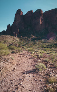 Rock formation on land against sky