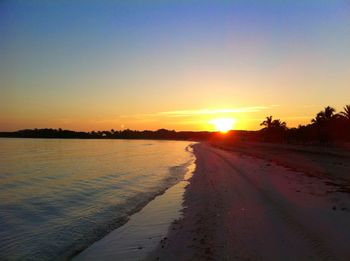 Scenic view of sunset over river