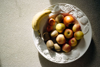 High angle view of fruits in bowl on table