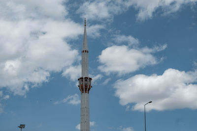 Low angle view of mosque minaret against sky