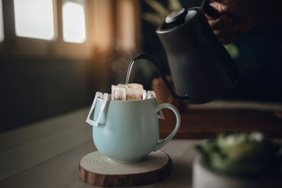 Close-up of coffee cup on table