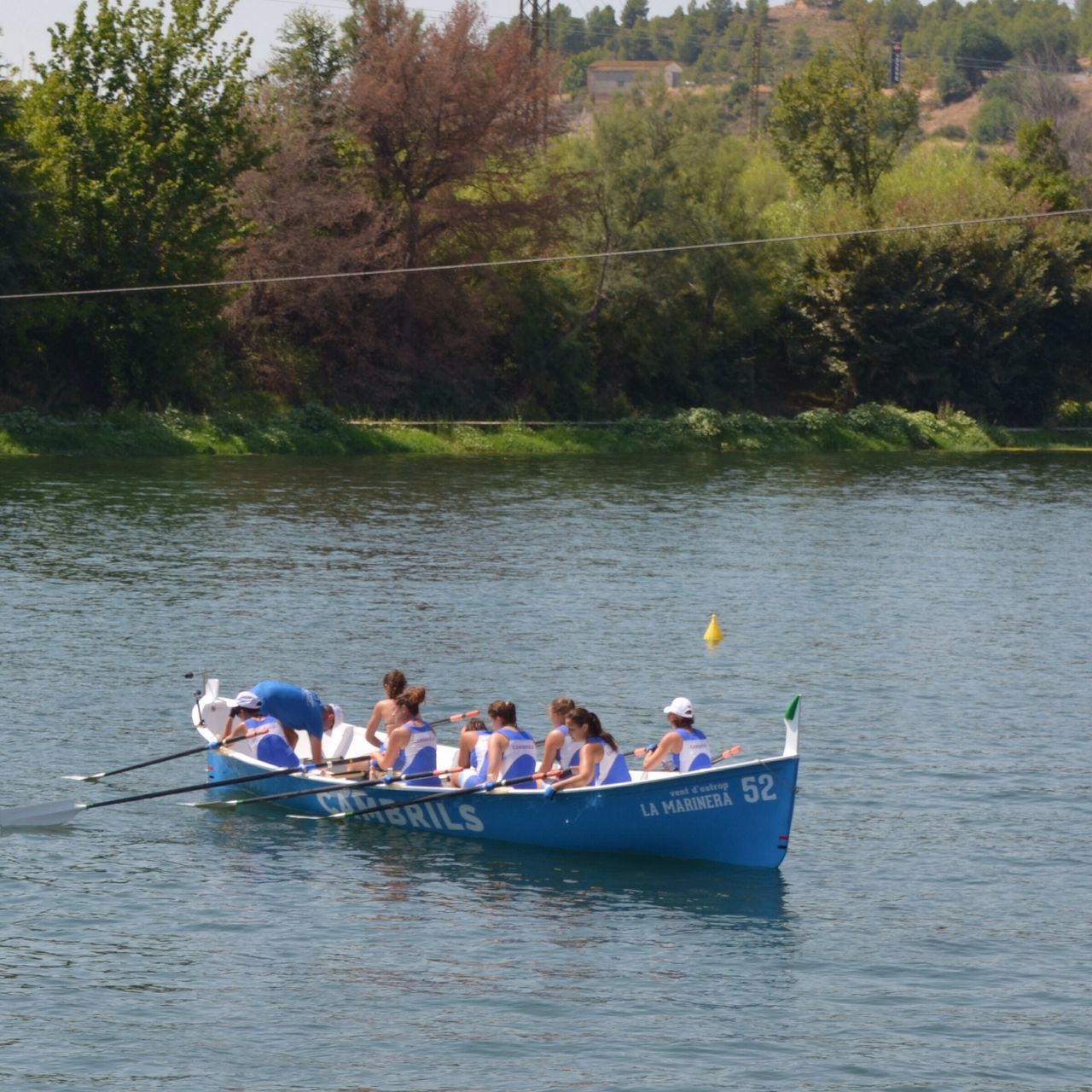 water, lifestyles, leisure activity, nautical vessel, transportation, men, boat, mode of transport, waterfront, lake, full length, river, oar, vacations, sitting, togetherness, casual clothing