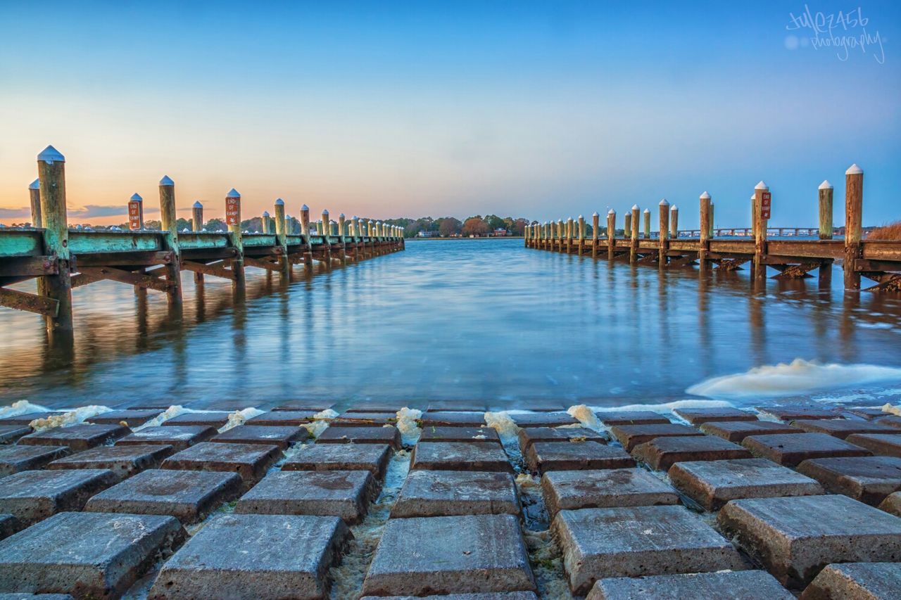 VIEW OF PIER ON SEA