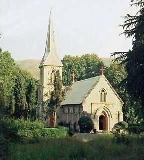 tree, building exterior, architecture, built structure, grass, religion, church, house, place of worship, spirituality, field, clear sky, sky, growth, green color, day, outdoors, nature