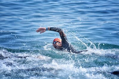 Man swimming in sea