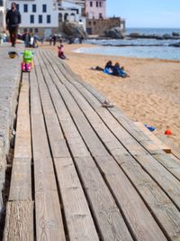 Close-up of people on beach