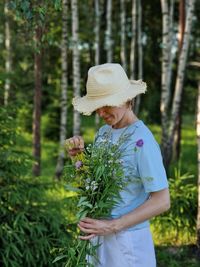 Woman wit field flowers