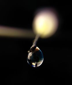 Close-up of illuminated light bulb