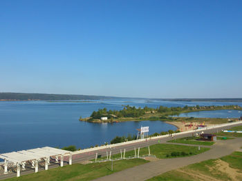 Panoramic top view of the embankment square and the river in summer