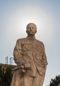 Low angle view of statue against sky