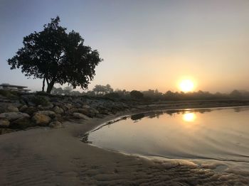 Scenic view of sea against sky during sunset