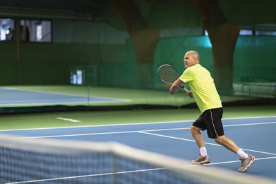 Man playing tennis