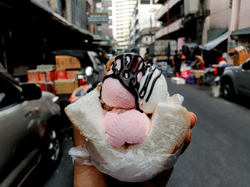 Close-up of ice cream in city