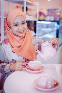 Portrait of a smiling young woman