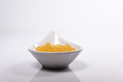 Close-up of food over white background