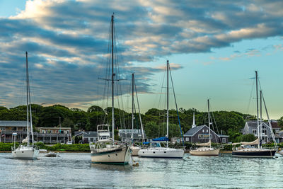 Boats moored at harbor