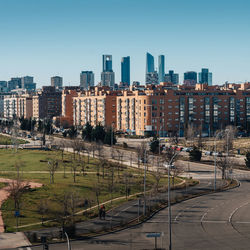 High angle view of buildings against clear sky