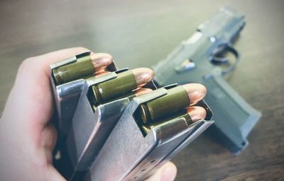 Close-up of hand holding electronic cigarette